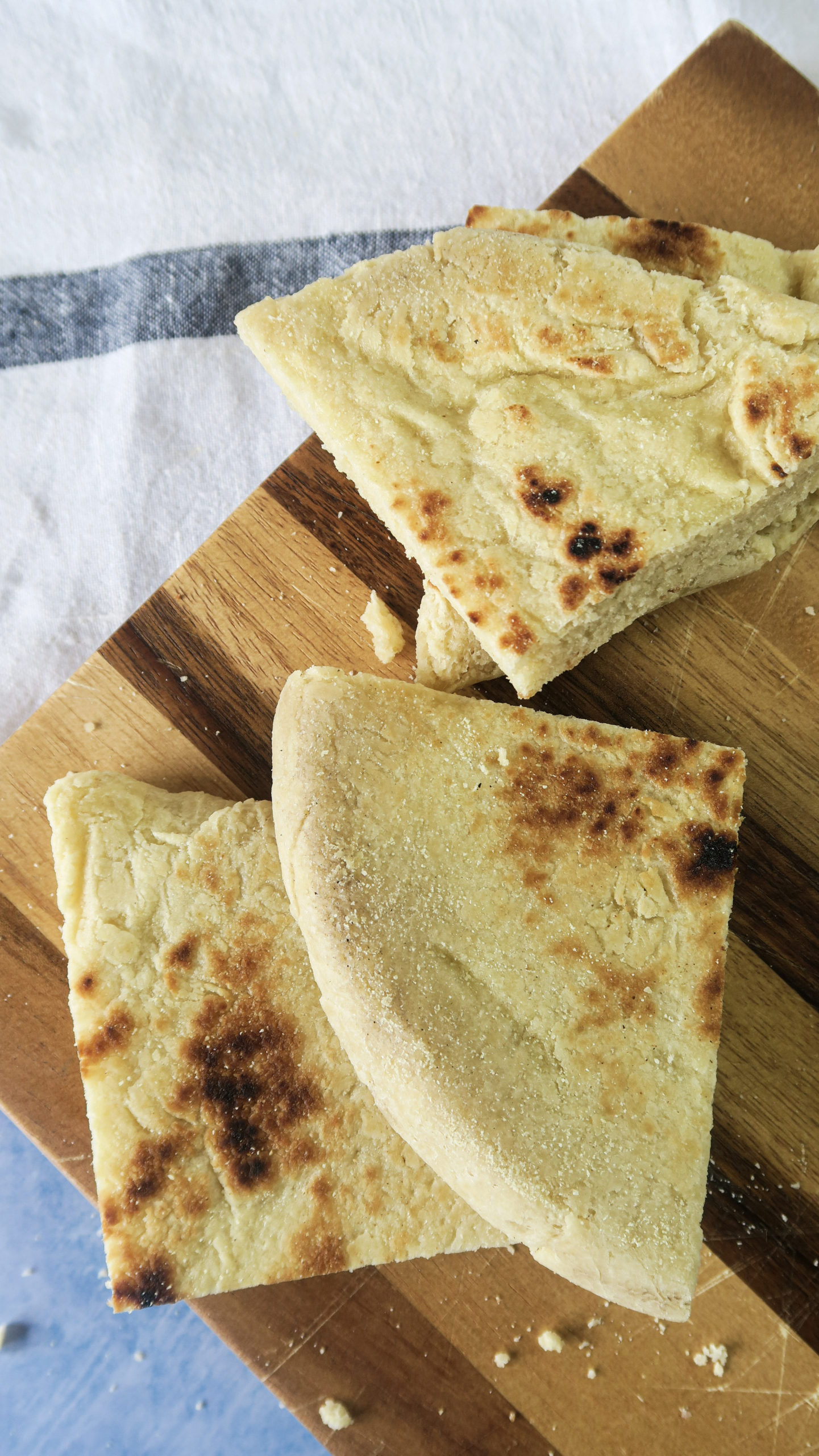 Semolina bread cut up on a chopping board