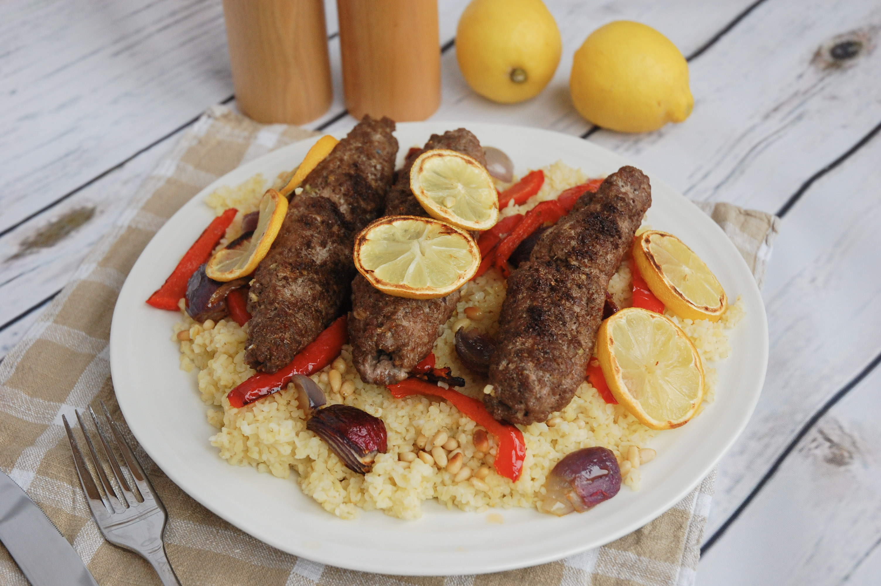 Lamb shish kebabs with grilled vegetables and bulgar wheat