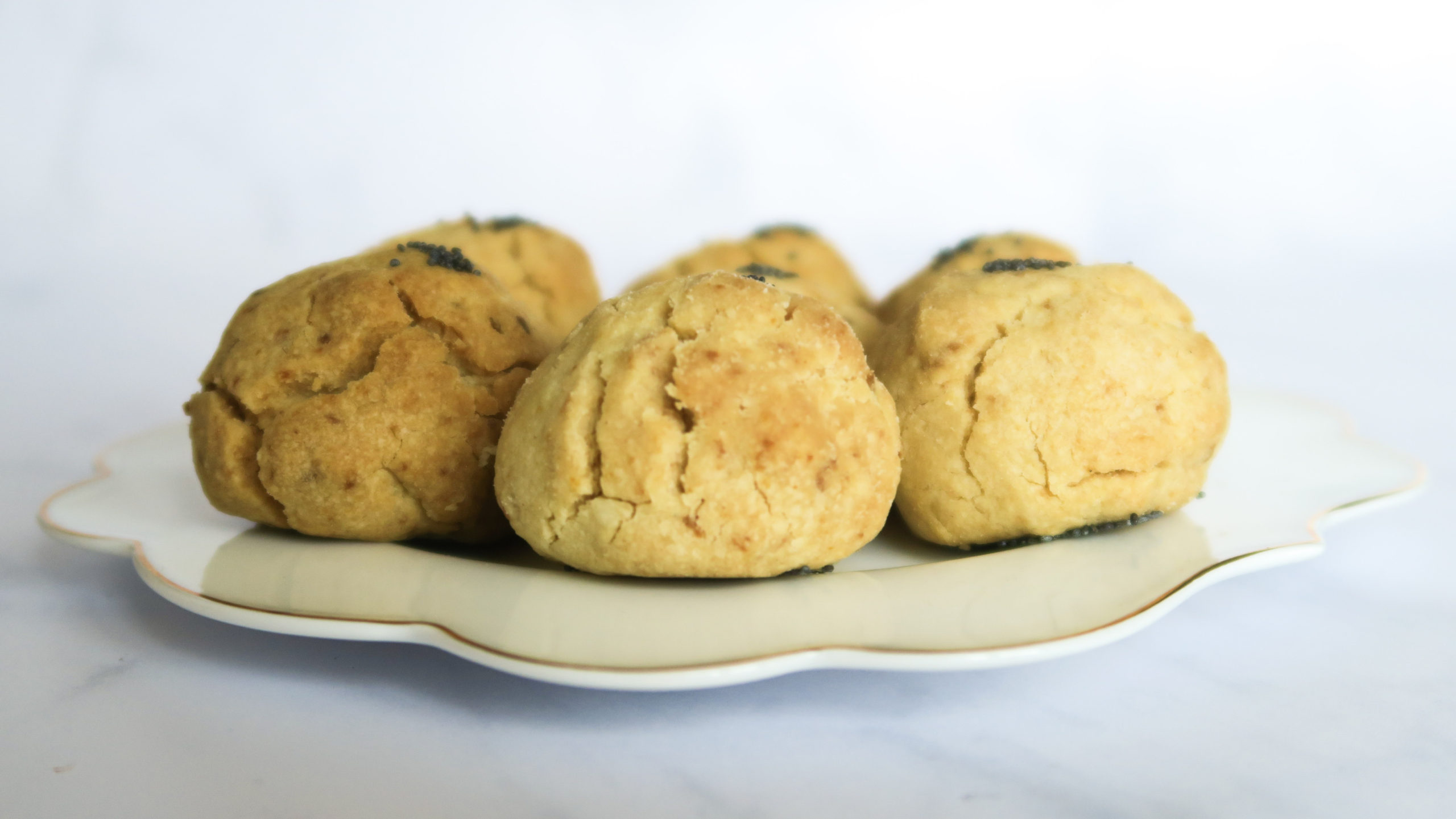 Lemon and poppy seed biscuits on a plate