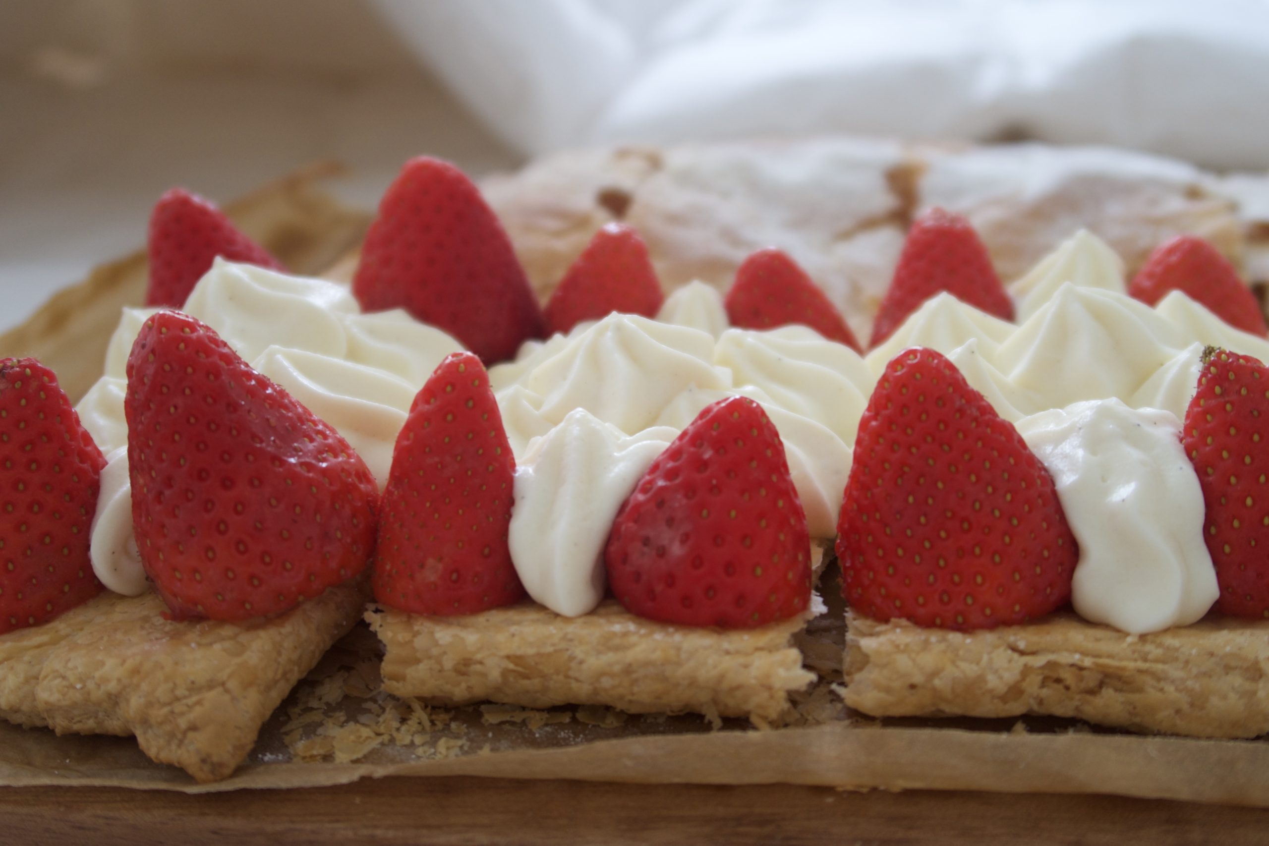 side shot of filled mille-feuille with tops off