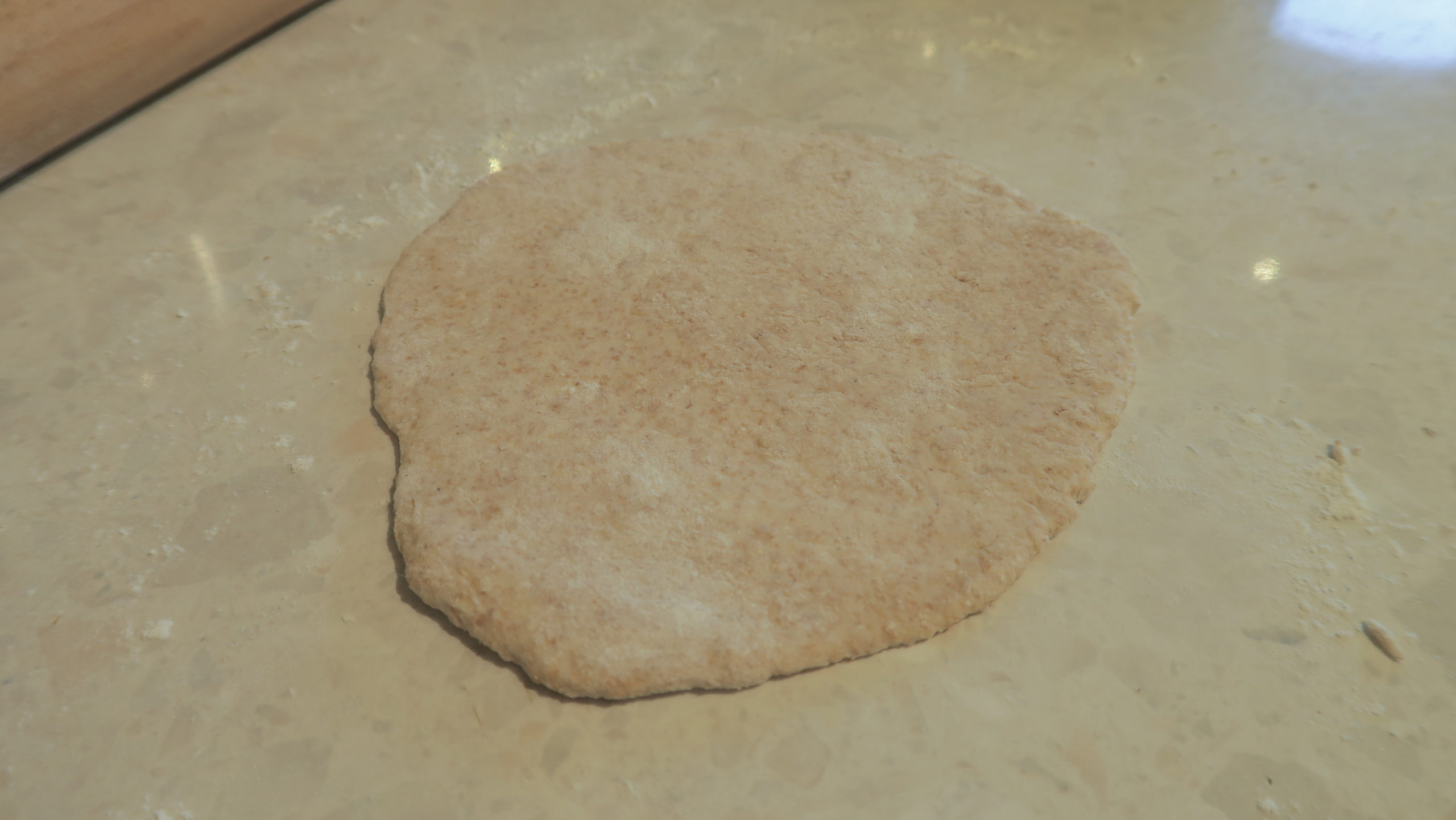 rolled out chapati dough