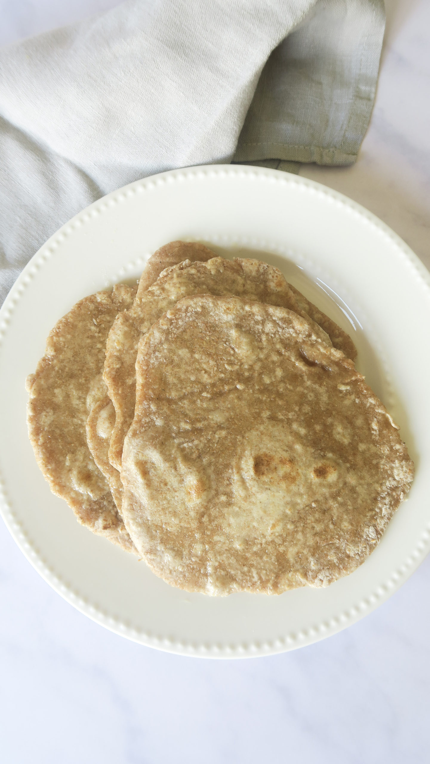 chapatis on a white plate