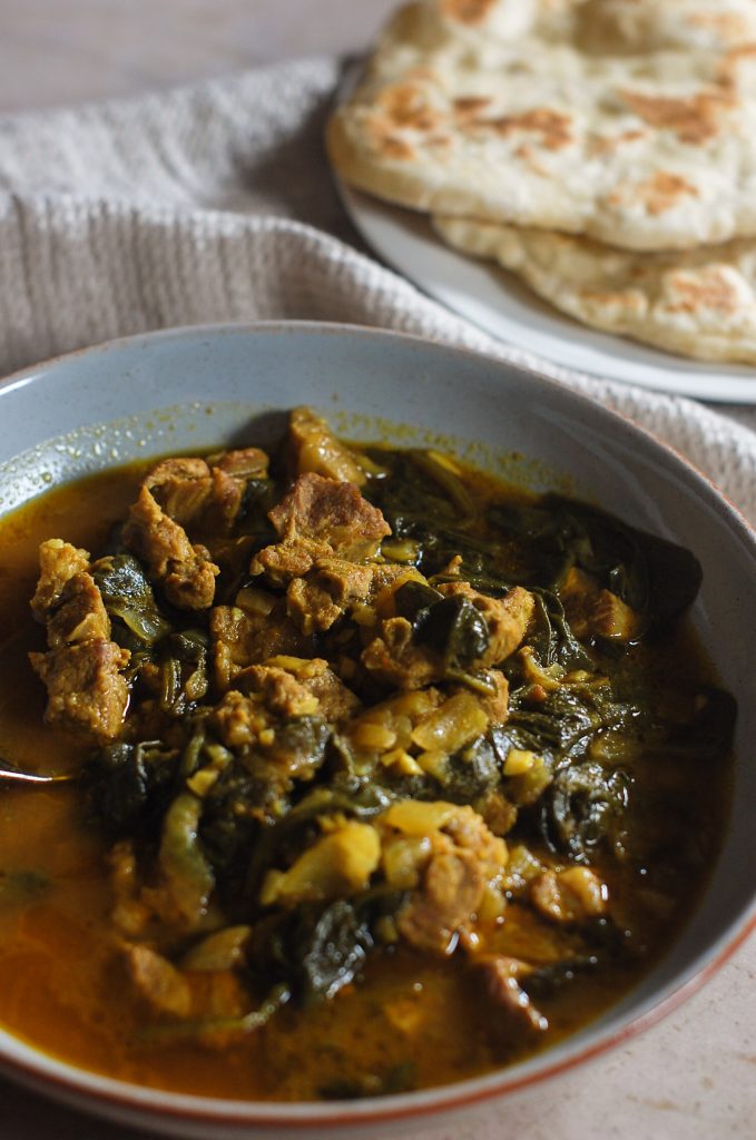 Lamb and spinach curry with naan bread