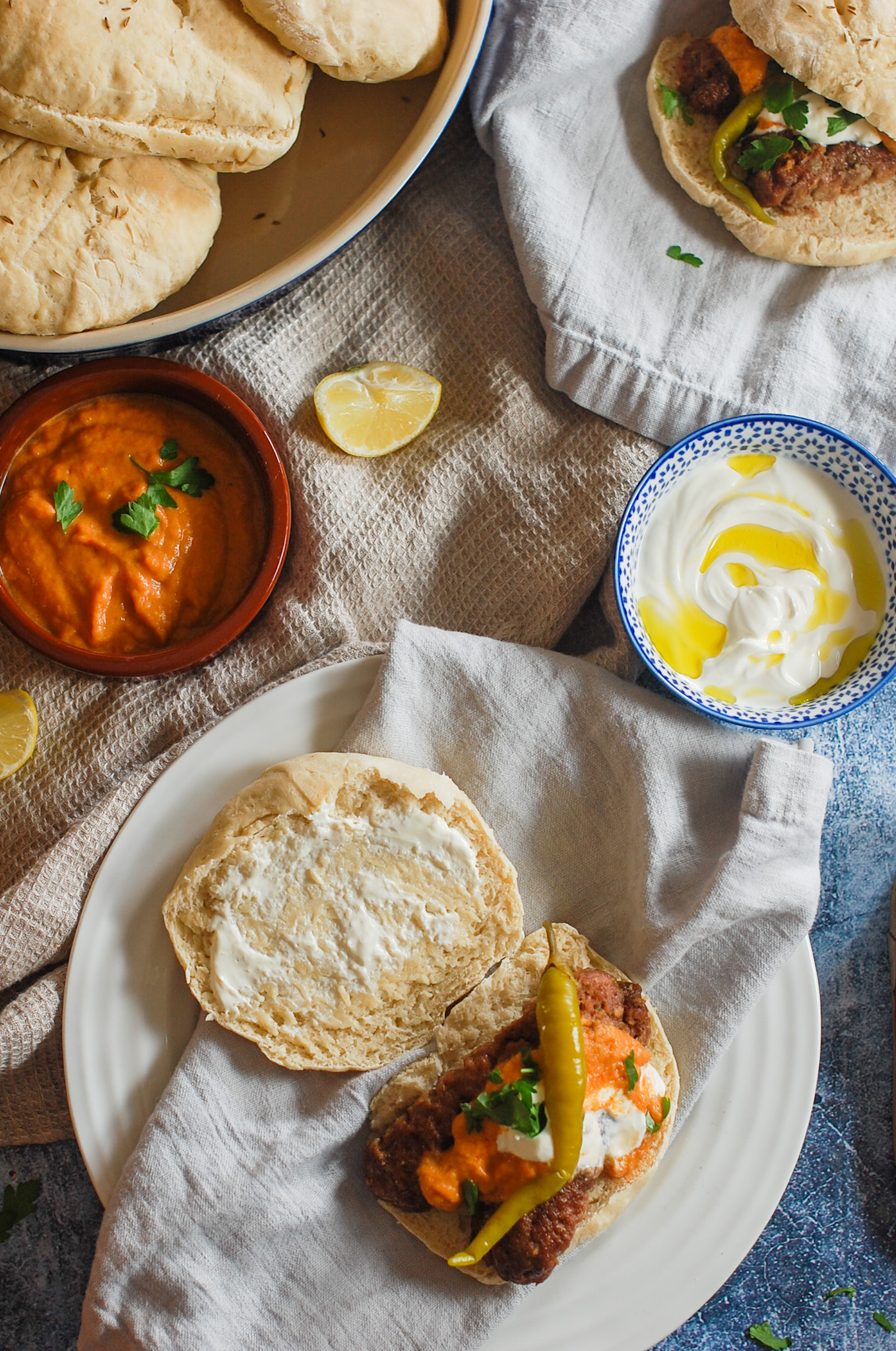 Ajvar red pepper sauce with cevapi and lepinja bread