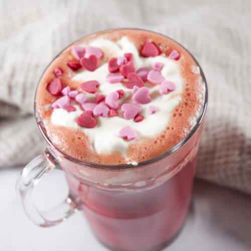 red velvet latte in a clear glass