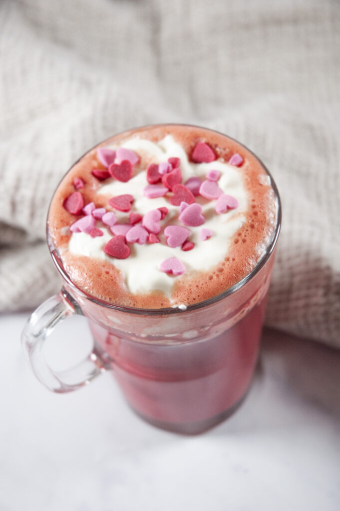 red velvet latte in a clear glass